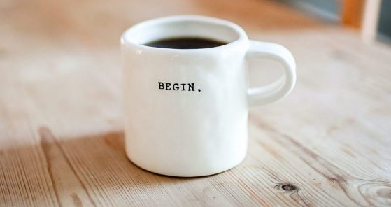 A mug of coffee with the word 'begin' on it, symbolising a fresh start for parents seeking support and guidance